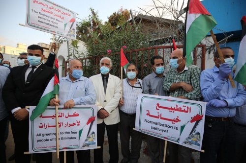 Palestinians protests outside the UNESCO office in Gaza against Bahrain's normalisation deal with Israel [Mohmmed Asad/Middle East Monitor]