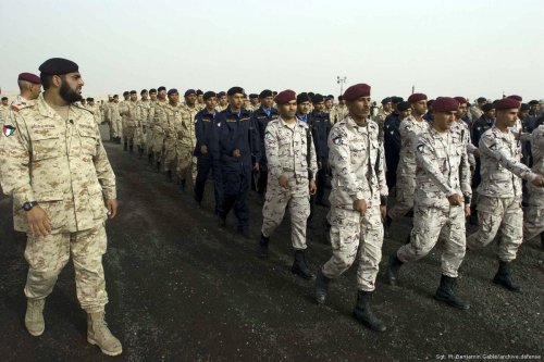 Kuwaiti soldiers at Camp Arifjan, Kuwait, march in formation on February 21, 2011 [Sgt. M. Benjamin Gable / US DoD]