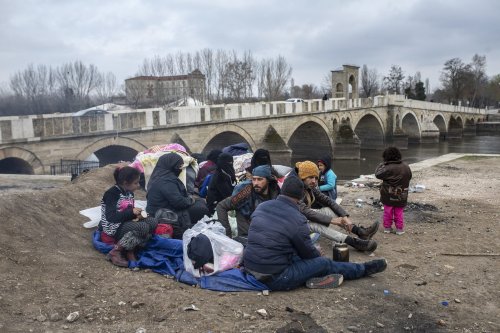 Asylum seekers, including Afghans [Arif Hüdaverdi Yaman/Anadolu Agency]