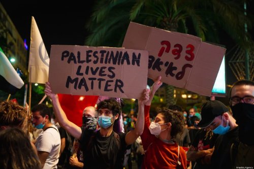 Israelis gather to stage a demonstration to protest against Israel's annexation plan for the illegal settlements in West Bank and Jordan Valley, in Tel Aviv, Israel on June 6, 2020 [Nir Keidar / Anadolu Agency]