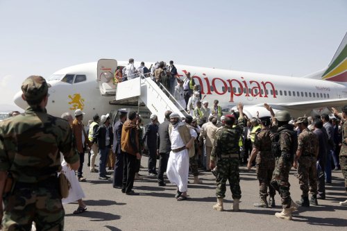 SANAA, YEMEN - OCTOBER 15: A group of 230 Houthi prisoners arrive at Seyoun Airport by a plane of the International Committee of the Red Cross (ICRC) after the Yemeni government and the Houthi rebel group exchanged prisoners in line with a swap deal between them in Sanaa, Yemen on October 15, 2020. ( Mohammed Hamoud - Anadolu Agency )