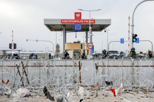 Border guards on the Polish side continue to wait under intense security, as the area on the Belarusian side is being organized and cleared, at the Poland-Belarus border, on November 21, 2021 in Belarus [Sefa Karacan/Anadolu Agency]