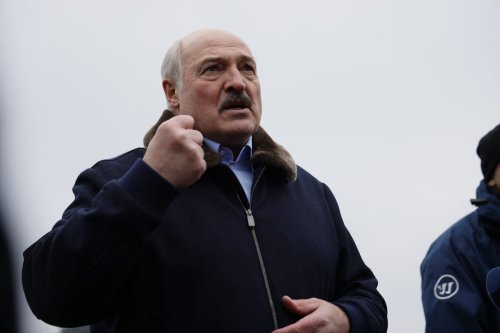 Belarusian President Alexander Lukashenko visits migrants waiting at the closed area allocated by Belarusian government on the Belarusian-Polish border in Grodno, Belarus on 26 November 2021. [Sefa Karacan - Anadolu Agency]