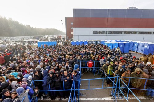 Migrants continue to wait at a closed area allocated by Belarusian government the Belarusian-Polish border in Grodno, Belarus on November 28, 2021 [Sefa Karacan/Anadolu Agency]