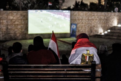 Fans watch a football match in Cairo, Egypt on 3 February 2022 [Stringer/Anadolu Agency]