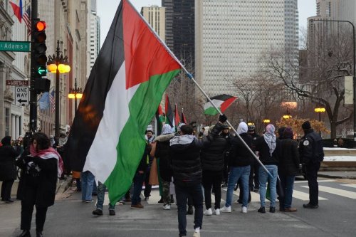 People march during a protest organized by Chicago Coalition for Justice in Palestine [Jacek Boczarski/Anadolu Agency]