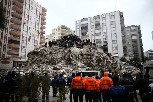 Search and rescue operation is being carried out at the debris of a building in Cukurova district of Adana after a 7.4 magnitude earthquake hit southern provinces of Turkiye, in Adana, [Eren Bozkurt/Anadolu Agency]