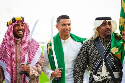 Cristiano Ronaldo (C) of Al Nassr performs sword dance with traditional clothes within the celebrations for Saudi Arabia's founding anniversary in Riyadh, Saudi Arabia on February 22, 2023 [Al Nassr Club of Saudi Arabia - Anadolu Agency]