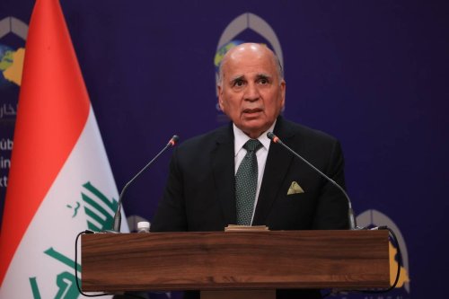 Iraqi Foreign Minister Fuad Hussein hold a joint press conference in Baghdad [Murtadha Al-Sudani - Anadolu Agency]
