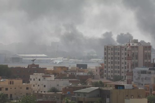 Smoke rises from Khartoum International Airport as clashes continue in the Sudanese capital on April 16, 2023 between the Sudanese Armed Forces and the paramilitary Rapid Support Forces (RSF) [Stringer - Anadolu Agency]