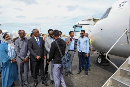 The Somalis, who were evacuated due to the clashes between the Sudanese Armed Forces and the paramilitary Rapid Support Forces (RSF), in Sudan, reach Aden Adde Airport in the capital Mogadishu, Somalia on April 30, 2023 [Abukar Mohamed Muhudin - Anadolu Agency]