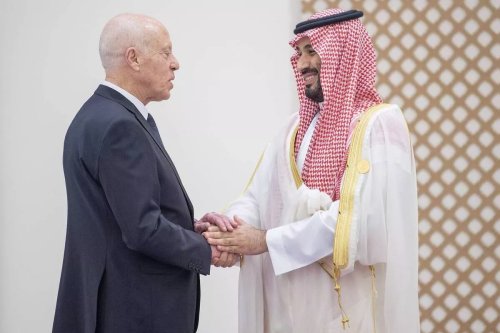 Saudi Arabian Crown Prince Mohammed bin Salman (R) greets Kais Saied (L), President of Tunisia in Jeddah, Saudi Arabia. [Royal Court of Saudi Arabia - Anadolu Agency ]