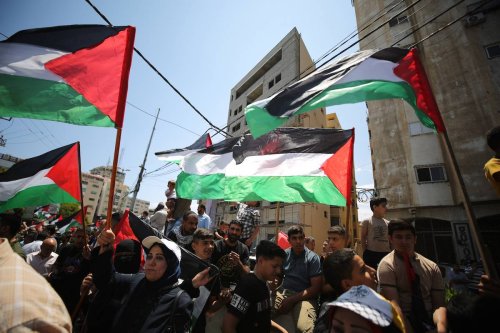 Palestinians hold a demonstration as they demand financial support to the United Nations Relief and Works Agency for Palestine Refugees (UNRWA), in front of the UNRWA building in Gaza Strip, Gaza on June 20, 2023 [Ali Jadallah - Anadolu Agency]