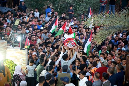 People attend funeral of Palestinian youth after he has been shot dead by Israeli settlers in Turmus Ayya district of Ramallah, West Bank on June 21, 2023 [Issam Rimawi/Anadolu Agency]