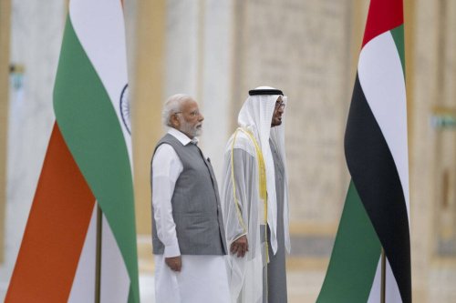 Indian Prime Minister Narendra Modi (L) is received by UAE Crown Prince Sheikh Khalid bin Mohammed bin Zayed Al Nahyan (R) with an official ceremony at Qasr Al-Watan (Palace of the Nation), in Abu Dhabi, United Arab Emirates on July 15, 2023 [UAE Presidential Court/Handout/Anadolu Agency]