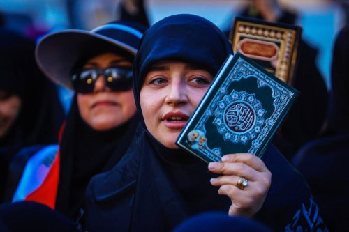 People gather to protest against burning of Quran in Denmark on July 22, 2023 in Baghdad, Iraq. [Murtadha Al-Sudani - Anadolu Agency]