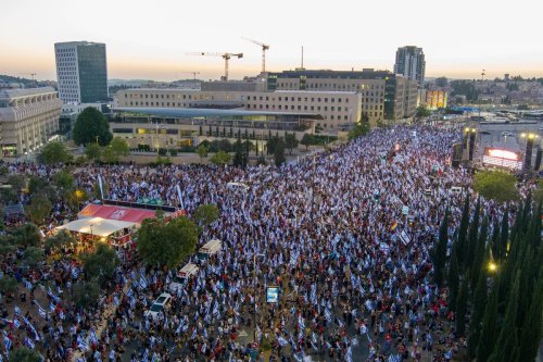 An aerial view of the protesters, who oppose the judicial overhaul plan of Israeli Prime Minister Benjamin Netanyahu's coalition, stage a protest in front of the Knesset (parliament) in Jerusalem on July 23, 2023. [Yair Palti - Anadolu Agency]