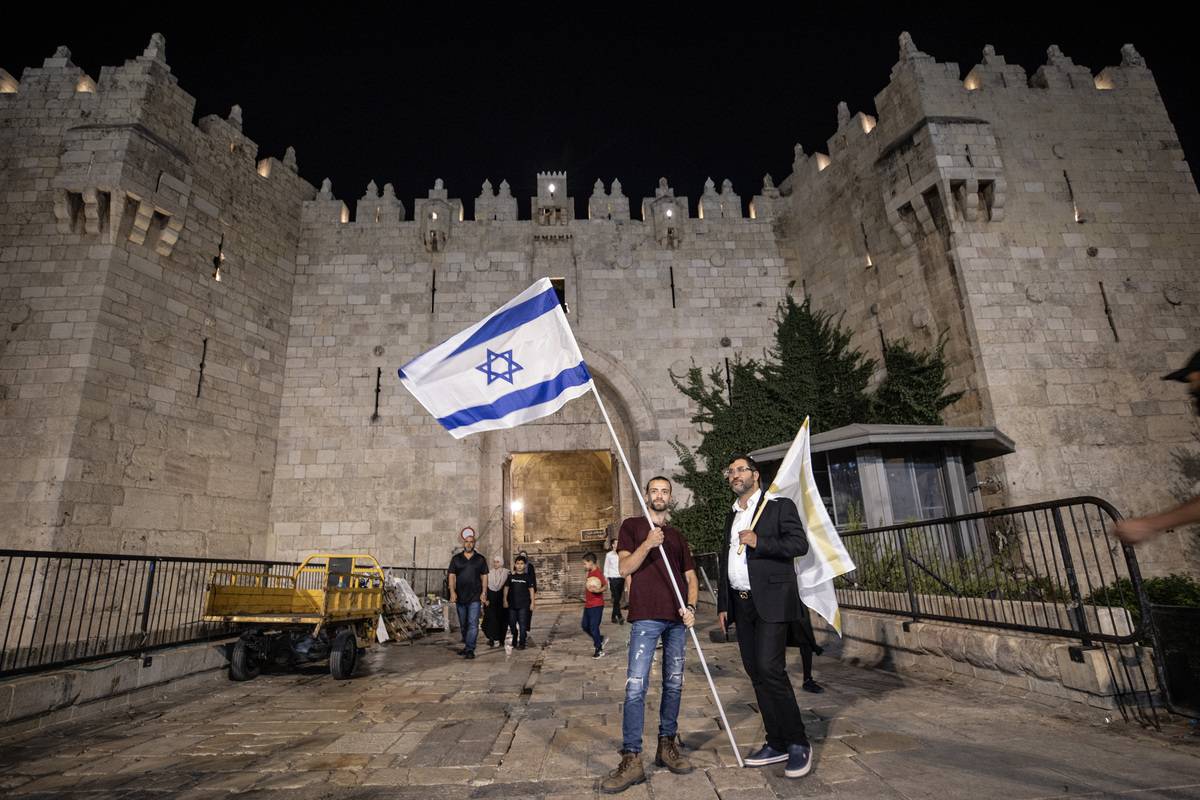 Israeli settlers march from Damascus Gate to the Western Wall, which is the southwest wall of Masjid al-Aqsa, on the day of mourning, which they called "Tisha BeAv", in Jerusalem on July 26, 2023 [Mustafa Alkharouf - Anadolu Agency]