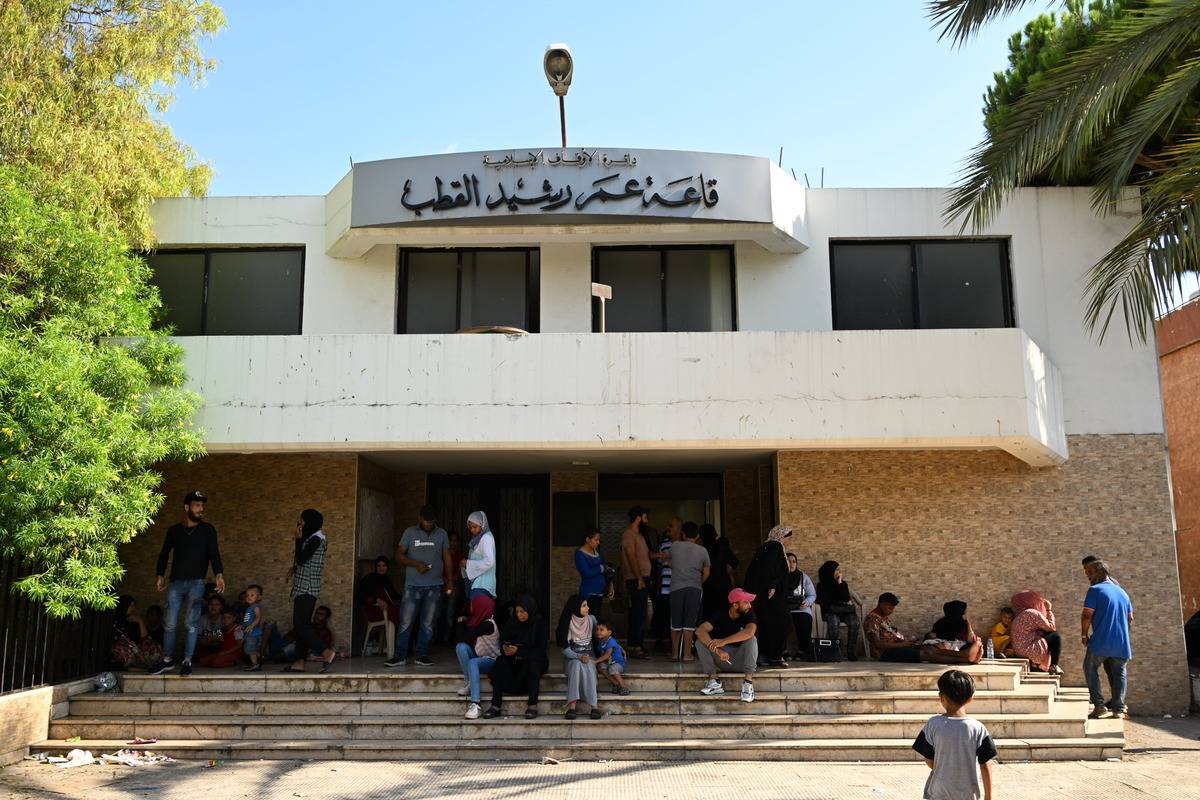 Refugees take refuge in schools and cultural centers after clashes between two groups at the Palestinian refugee camp of Ain al-Helwa in Sidon, Lebanon on July 30, 2023. [Houssam Shbaro - Anadolu Agency]