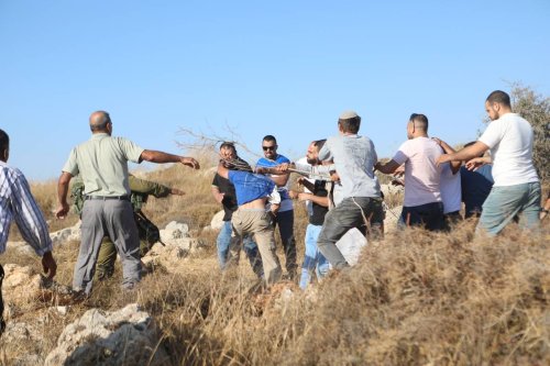 Israeli forces intervene to Palestinians who staged a demonstration against land confiscation of Jewish settlers in Hebron, West Bank on August 01, 2023. [Mamoun Wazwaz - Anadolu Agency]