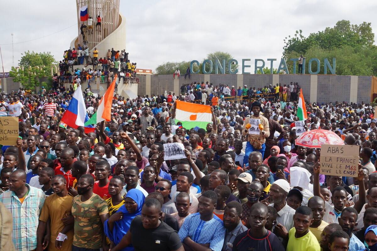 Coup supporters gather to stage a demonstration to protest the decision of the Economic Community of West African States (ECOWAS) countries to sanction Niger and to support the army, in Niamey, Niger on August 3, 2023. [Balima Boureima - Anadolu Agency]
