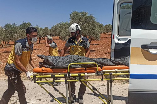 Teams conduct search and rescue operations after Russian airstrikes hit Ein Shib village of Idlib, Syria killing 3 civilians and injuring 6 on August 05, 2023. [Hatib İdlibi - Anadolu Agency]