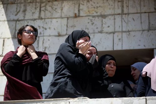 Relatives of 19-year-old Qusay Jamal Matan, who killed by Israeli settlers in gun attack, mourn during funeral ceremony in Burka village of Ramallah, West Bank on August 05, 2023. [Issam Rimawi - Anadolu Agency]