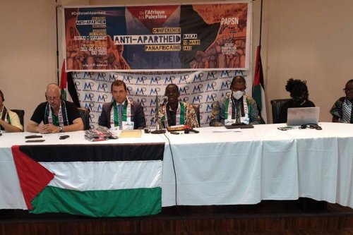 Left to Right: Saleh Hijazi, head of Amnesty International Palestine, Jamal Juma', head of Stop The Wall Campaign and founding member of the BDS Movement, Safwat Ibraghith, Palestinian Ambassador to Senegal, Madieye Mbodj, Chair of the Senagalese Palestine Solidarity Committee; Nkosi Zwelivelile Mandela ( South African Parliamentarian and grandson of Nelson Mandela), Roshan Dadoo - South African BDS Coalition, Emma Nyerere, Pan African Women's Organisation