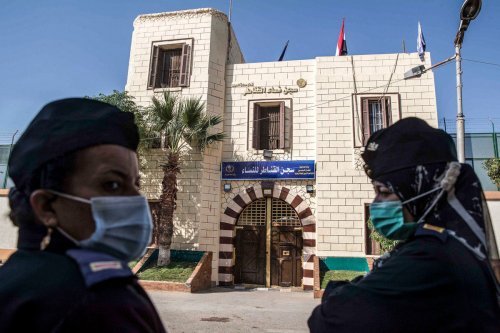 Guards stand outside a prison in Egypt on 27 December 2020 [KHALED DESOUKI/AFP/Getty Images]