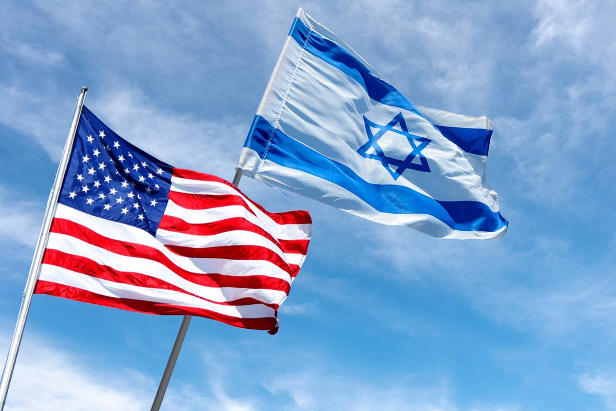 United States and Israel flags near the American Embassy in Jerusalem, Israel. [Photo via Getty Images]