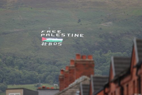 A protest banner against Israel saying Free Palestine during the International Friendly between Northern Ireland and Israel at Windsor Park on September 11, 2018 in Belfast, Northern Ireland [Photo by James Williamson - AMA/Getty Images]