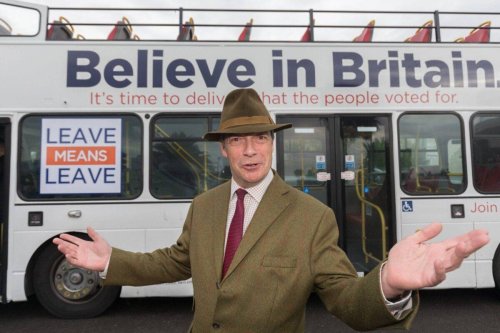 MEP and former leader of the UK Independence Party (UKIP) Nigel Farage travels on the pro-Brexit 'Leave Means Leave' battle bus ahead of the 'Leave Means Rally' at the Rivera International Centre on October 13, 2018 in Torquay, England [Matt Cardy/Getty Images]