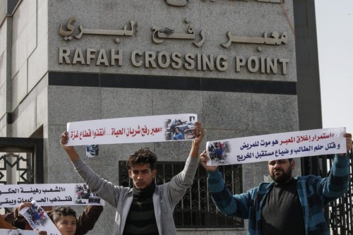 Palestinians protest against the closure of the Rafah crossing point between Egypt and the southern Gaza Strip and the Israeli blockade on the territory, on 24 January 2019 in Rafah. [SAID KHATIB / AFP / Getty]