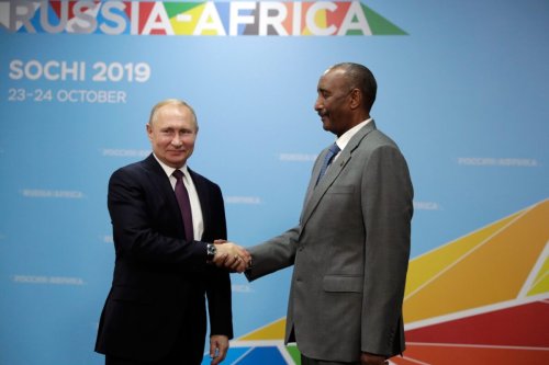 Russian President Vladimir Putin meets with President of Sudanese Transitional Council General Abdel Fattah al-Burhan on the sidelines of the 2019 Russia-Africa Summit in Sochi on October 23, 2019 [MIKHAIL METZEL/SPUTNIK/AFP via Getty Images]