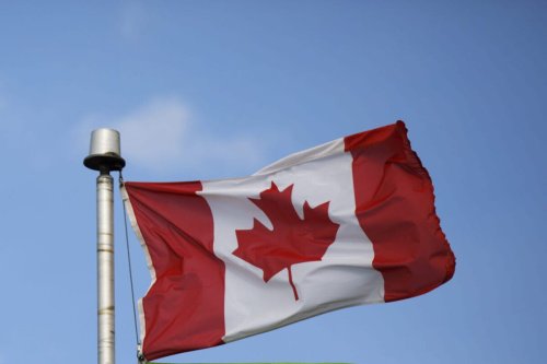 Canadian flag [Cole Burston/Bloomberg via Getty Images]