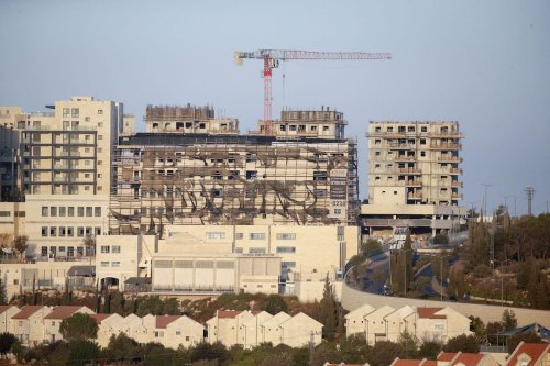 New buildings in the Israeli settlement in Bethlehem in the occupied West Bank.[HAZEM BADER/AFP via Getty Images]