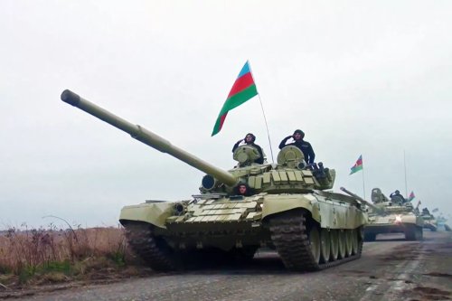 Azerbaijani Army enter Agdam district in Nagorno-Karabakh following 27 years with armored vehicles on November 20, 2020. [Photo by Azerbaijan Ministry of Defence/Handout/Anadolu Agency via Getty Images]