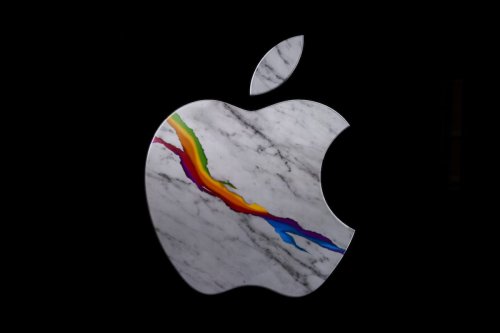 Apple brand logo is seen at the official opening of the new Apple Store Via Del Corso, on 27 May 2021, in Rome, Italy. [Antonio Masiello/Getty Images]