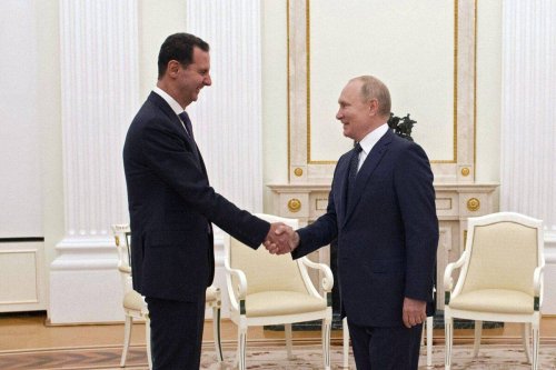 Russian President Vladimir Putin meets with Syrian President Bashar al-Assad [MIKHAIL KLIMENTYEV/SPUTNIK/AFP via Getty Images]