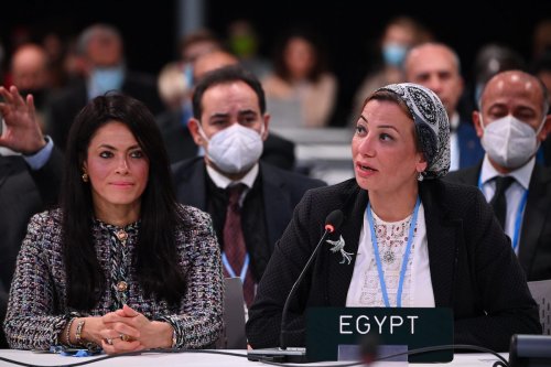 Members of the Egypt delegation accept the next COP (Conference of the Parties) for COP27 which will be held next year at Sharm El Sheikh, Egypt, during the COP26 Closing Plenary Part 1 on 11 November 2021 in Glasgow, Scotland. [Jeff J Mitchell/Getty Images]