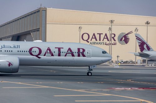 A passenger aircraft, operated by Qatar Airways at Hamad International Airport in Doha, Qatar [Christopher Pike/Bloomberg/Getty Images]
