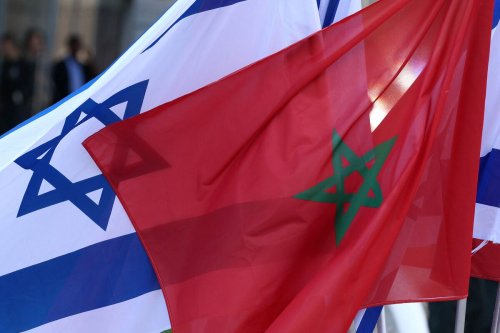 Israeli and Moroccan flags are pictured during an official ceremony in Israel's Mediterranean coastal city of Tel Aviv, on September 13, 2022. [JACK GUEZ/AFP via Getty Images]