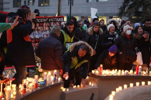 Hundreds attended a candlelight vigil at Mel Lastman Square in Toronto, Ontario, Canada, on January 08, 2023 as Iranian-Canadians marked 3rd anniversary of the downing of Ukrainian Airlines Flight PS752 [Creative Touch Imaging Ltd./NurPhoto via Getty Images]
