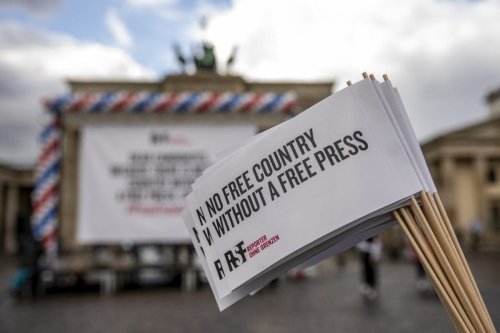 Supporters of Reporters Without Borders (RSF) on October 07, 2020 [Maja Hitij/Getty Images]