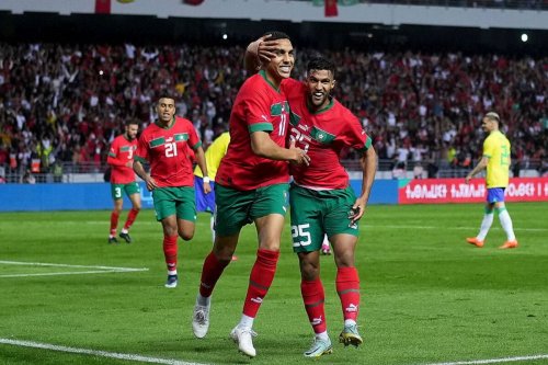 Abdelhamid Sabiri of Morocco celebrates after scoring their second side goal with Yahya Attiat Allah of Morocco during the international friendly match between Morocco and Brazil at Grand Stade de Tanger on March 25, 2023 in Tangier, Morocco. [Alex Caparros/Getty Images]