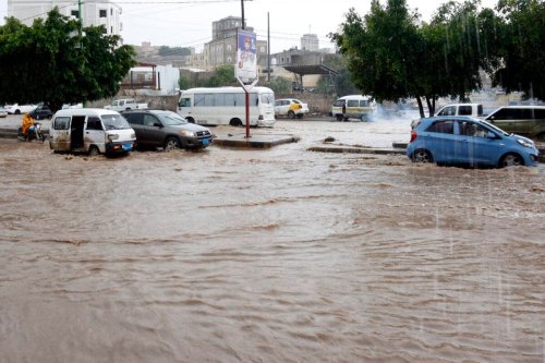 People drive through floods after heavy rains hit Sana'a City and other governorates on April 13, 2023 in Sana'a, Yemen [Mohammed Hamoud/Getty Images]