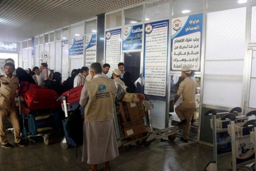 Pilgrims from the Houthi-controlled areas arrive at the Sana'a Airport to travel on direct flights to Saudi Arabia for pilgrimage, on June 17, 2023 in Sana'a, YemenMohammed [Hamoud/Getty Images]