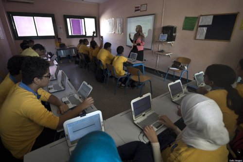 Egyptian students attend a secondary school class at the "Futures Tech" private school in Cairo on October 23, 2013 [Khaled Desouki/AFP via Getty Images]