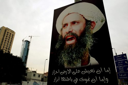 A portrait of late prominent Shia Muslim cleric Nimr al-Nimr is seen hanging on an electricity pole in the Lebanese capital, Beirut, on January 7, 2016 [JOSEPH EID/AFP via Getty Images]