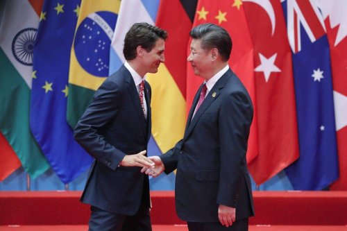 Chinese President Xi Jinping (right) shakes hands with Canadian Prime Minister Justin Trudeau on September 4, 2016 in Hangzhou, China [Lintao Zhang/Getty Images]